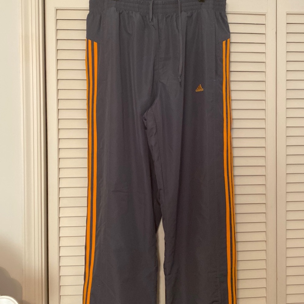 Mens Adidas Track pants. Size XL. Gray pants, orange stripes.